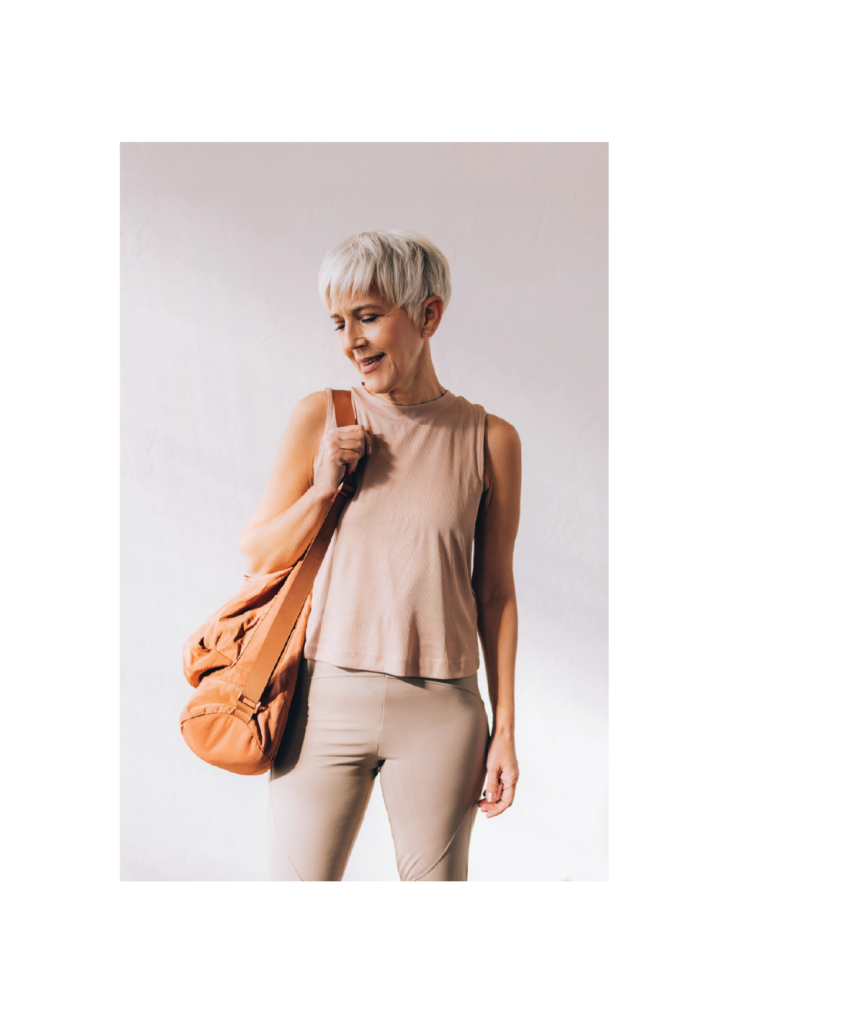 Woman standing with a bag on her shoulder